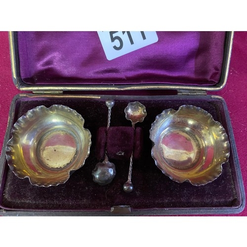 511 - Sterling silver pair of matching salts with original silver spoons