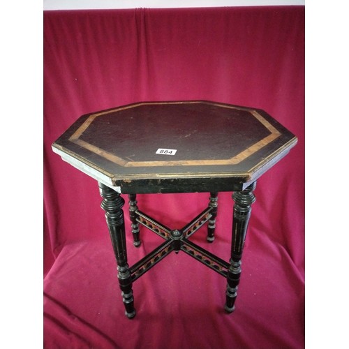 884 - Victorian ebonised hexagonal side table measuring 55 cms diameter and 58 cms tall