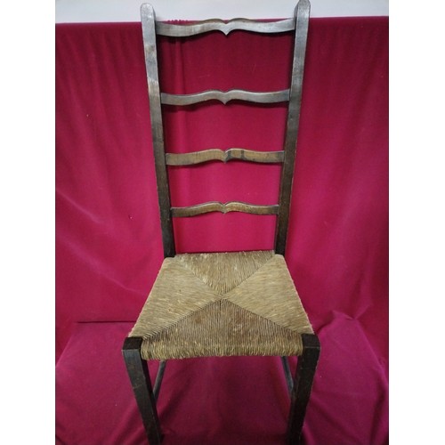 886 - Antique low ladder back chair with rush seat and stool