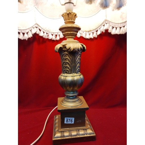 876 - Large wooden carved in gold table lamp with shade  measuring 86 cms tall, fully working