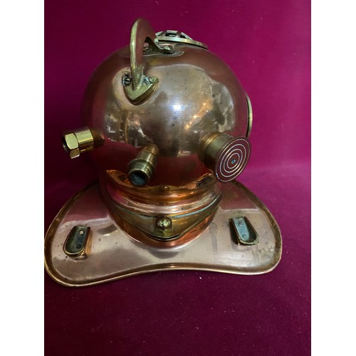 4 - Copper divers helmet clock.