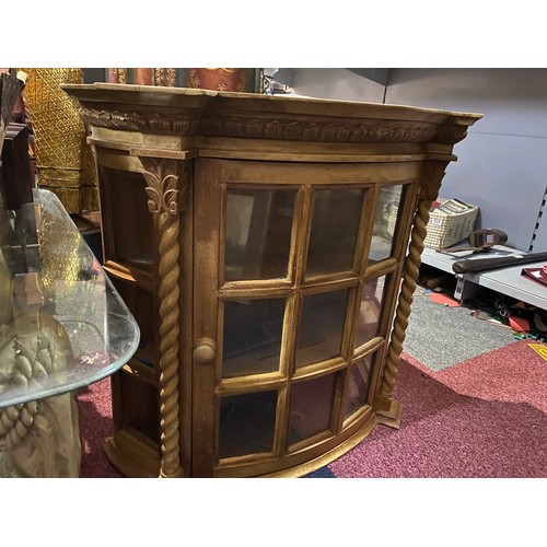 154 - Light wood display cabinet with glass front and 2 shelves, single opening door. Wall hanging or sit ... 