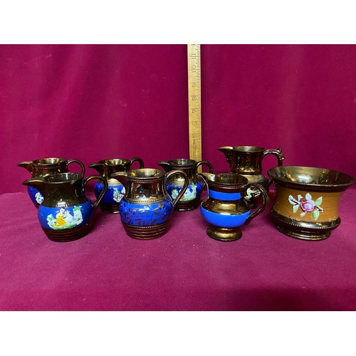 157 - Selection of 7 lustre ware jugs and 1 bowl.