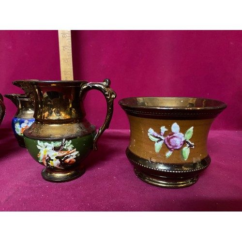 157 - Selection of 7 lustre ware jugs and 1 bowl.