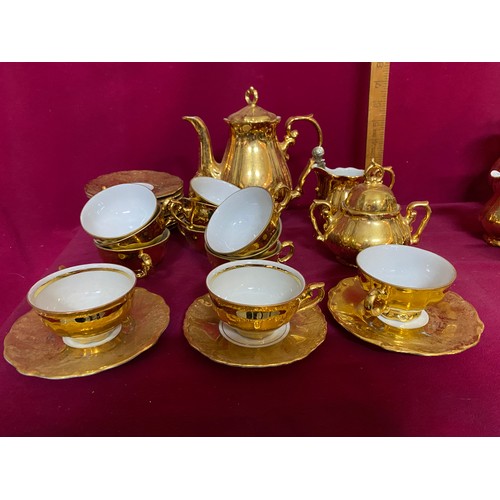 158 - Gold and white coffee set comprising of 12 cups and saucers, coffee pot, milk and sugar bowl.