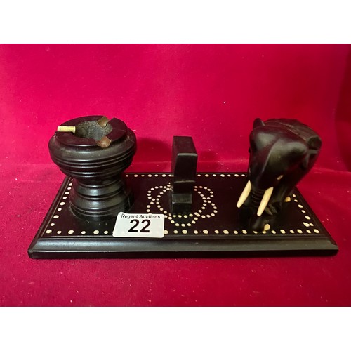 22 - Vintage Ebony matchbox holder and ashtray with elephant design.