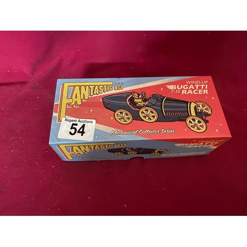 54 - Clockwork tin plate Bugatti racing car in box.