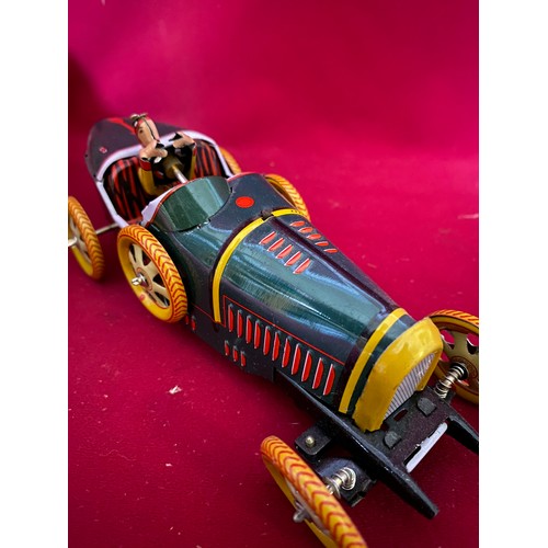 54 - Clockwork tin plate Bugatti racing car in box.