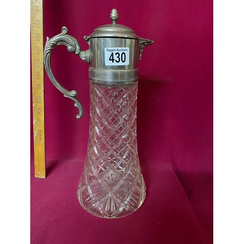 430 - Cut glass beverage decanter with silver plate flip top