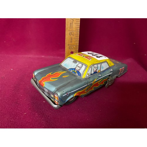 444 - 1950's vintage tin litho Mikuni wind-up roll-over stunt car, working