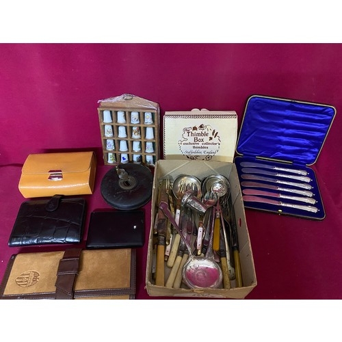 273 - Box of vintage curios including thimbles, cutlery, wallets, tape measure etc