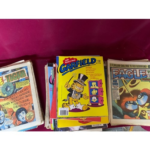 440 - Collection of over 150 kids vintage comics and magazines including Buster, Whizzer and Chips, Eagle,... 