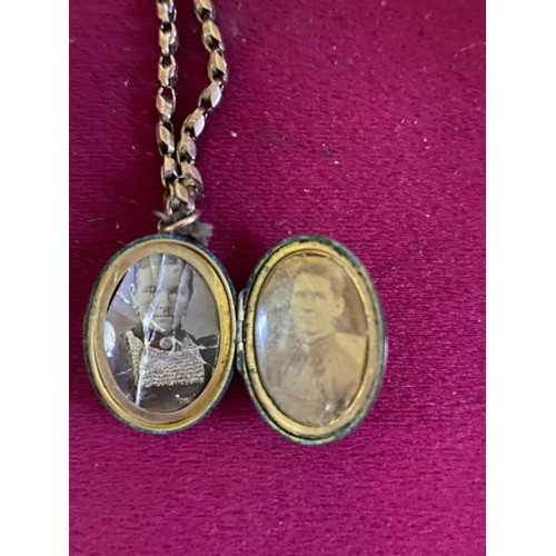 449 - Locket and chain marked 9CT gold front and back on locket only and weighing 13.3 g in total