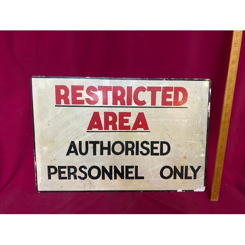 104 - Vintage metal sign measuring 61 x 40 cms 'Restricted area authorised personnel only'