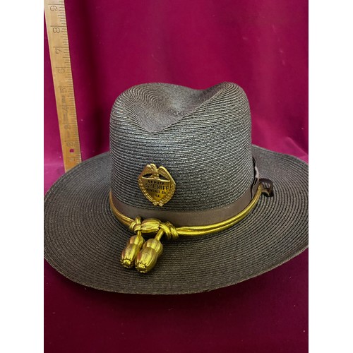 114 - Vintage Stratton Sheriff style straw hat size 71/4 and a US Marshal badge