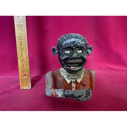 117 - Vintage 'greedy boy' moneybox measuring 14 cms tall