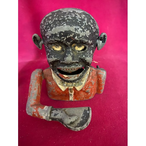 117 - Vintage 'greedy boy' moneybox measuring 14 cms tall