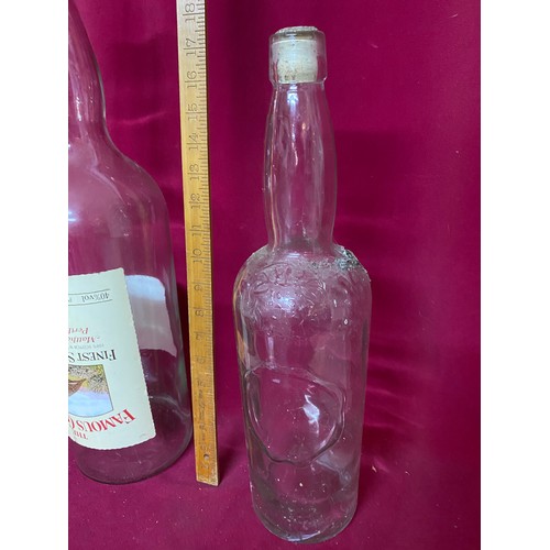 123 - 2 x large vintage whisky bottles, largest measures 52 cms tall