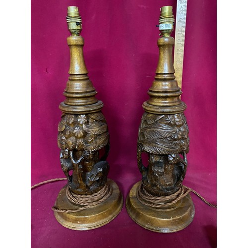 3 - 2 vintage hand carved wooden lamps.