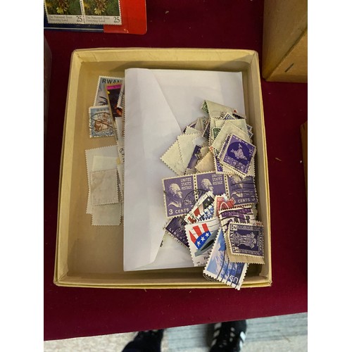 26 - Box filled with stamps and First Day Covers.