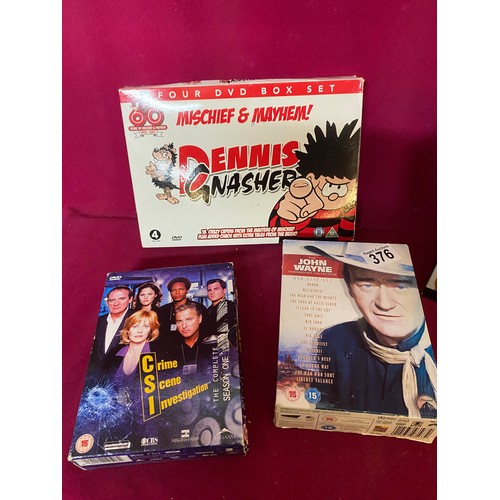 376 - Selection of DVD box sets including Friends, John Wayne, CSI and Dennis and Gnasher