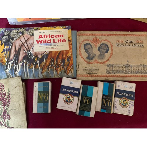 68 - Collection of vintage cigarette cards, trade cards and tea cards.