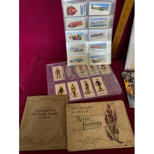 68 - Collection of vintage cigarette cards, trade cards and tea cards.