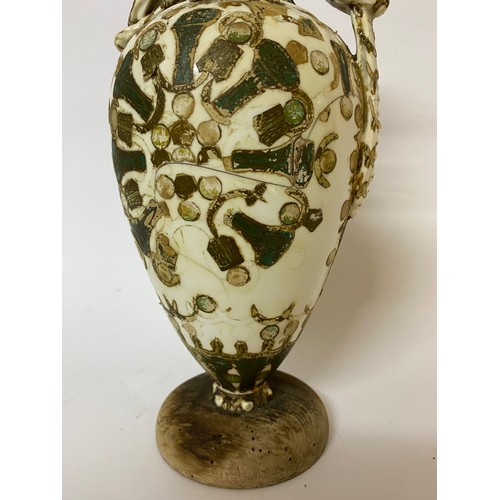 112 - Antique pottery urn/vase, hand decorated on wooden plinth standing 29 cms tall