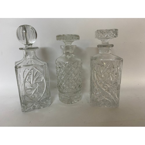 154 - 3 Crystal decanters, 1 basket and 1 lidded Bon-Bon dish.