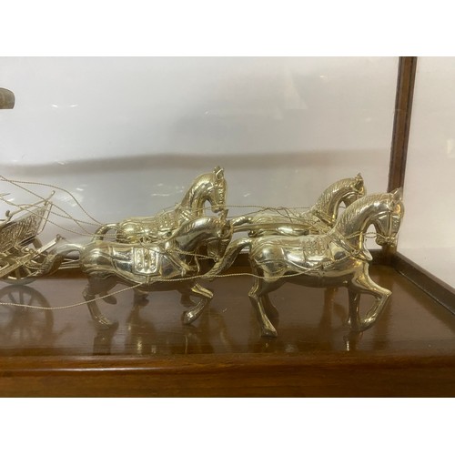 170 - Horse and carriage in Indian Silver set in glass display case. 41x19x13cms