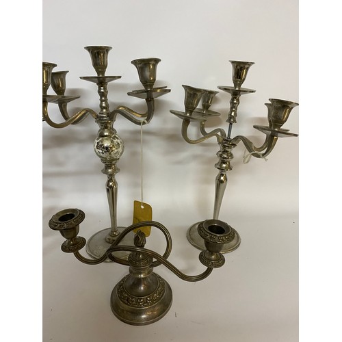 215 - Selection of modern and traditional candelabras.