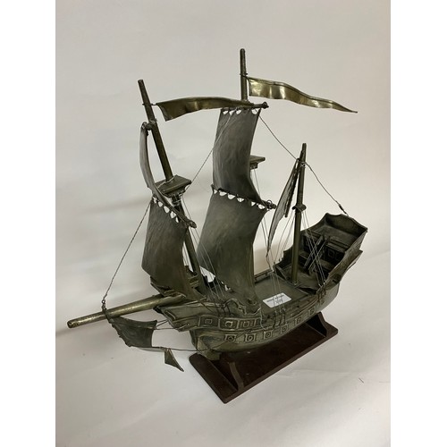 209 - Pewter Galleon on wooden base 45x43cms.