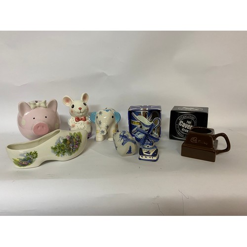 241 - Selection of pottery including money boxes, Delft and advertising mugs