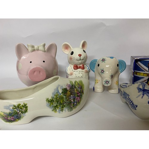 241 - Selection of pottery including money boxes, Delft and advertising mugs