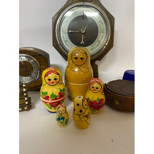 242 - Assortment of wooden items including Russian dolls, barometer, clock etc