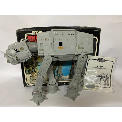 305 - Vintage Star Wars Empire Strikes Back AT-AT boxed and complete with instruction manual. Also has bul... 