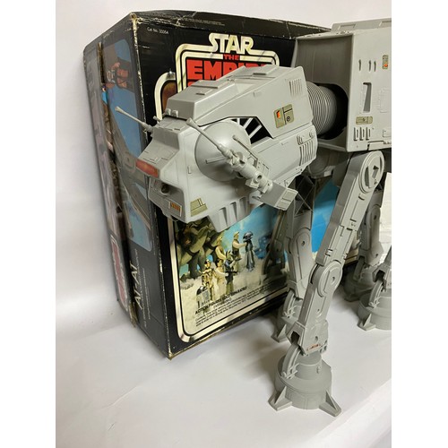 305 - Vintage Star Wars Empire Strikes Back AT-AT boxed and complete with instruction manual. Also has bul... 