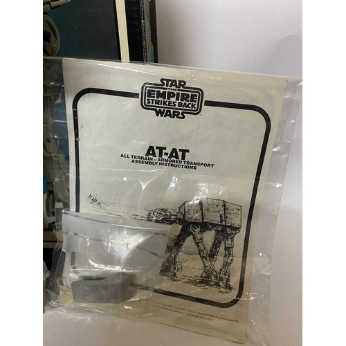 305 - Vintage Star Wars Empire Strikes Back AT-AT boxed and complete with instruction manual. Also has bul... 