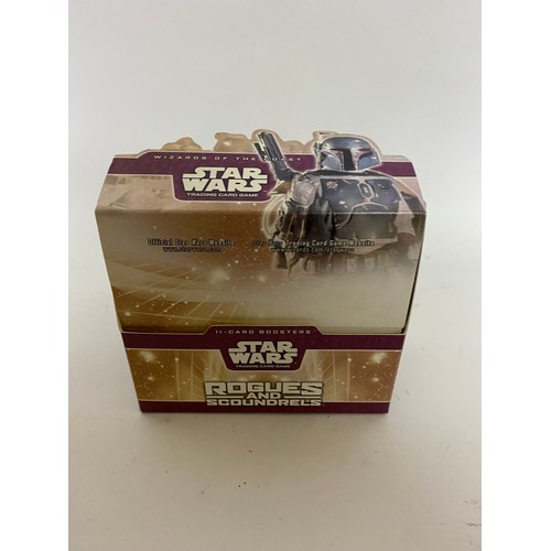 310 - Star Wars Rogues and Scoundrels TCG box of 13 sealed packets containing 7 common cards, 3 uncommon c... 