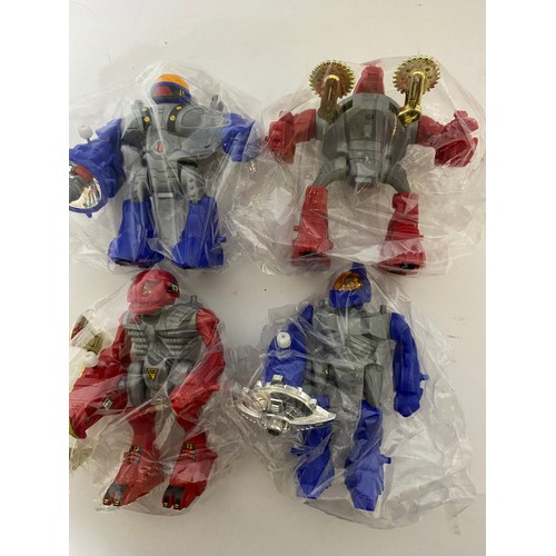 319 - 4 x vintage Tomy Robot Anti-Terror Squad figures in as new condition, made by Tomy in 1983