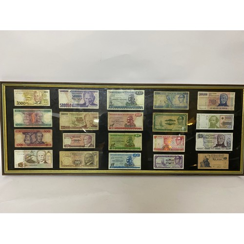 336 - Selection of 20 bank notes in frame measuring 99 x 37 cms