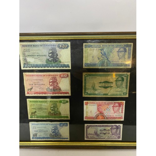 336 - Selection of 20 bank notes in frame measuring 99 x 37 cms