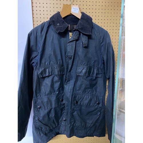 12 - Barbour waxed jacket in childs medium size.