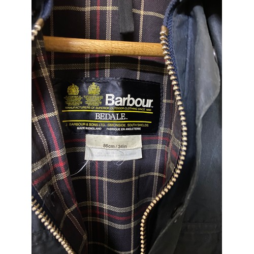 12 - Barbour waxed jacket in childs medium size.