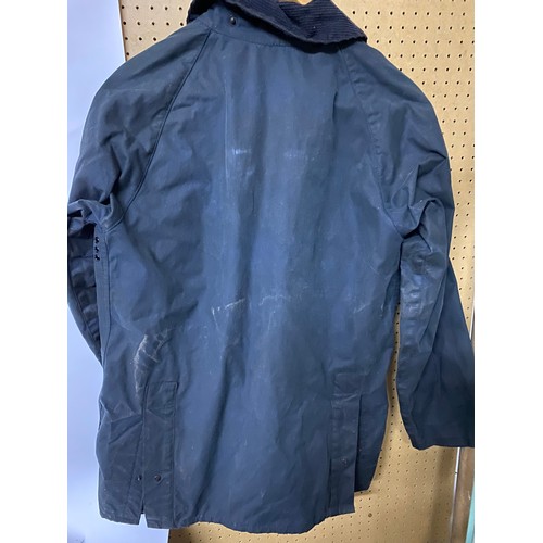 12 - Barbour waxed jacket in childs medium size.