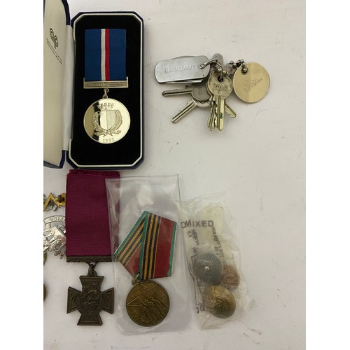 30 - Collection of Military medals, buttons, pins and bullets.