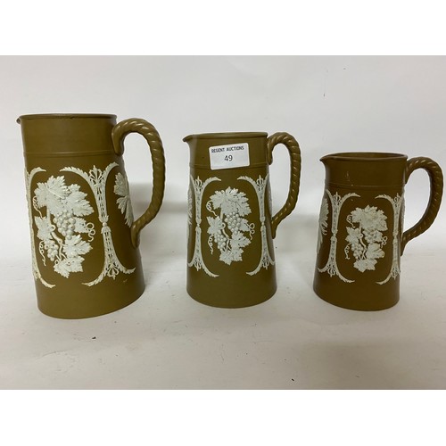 49 - 3 x Victorian graduated jugs