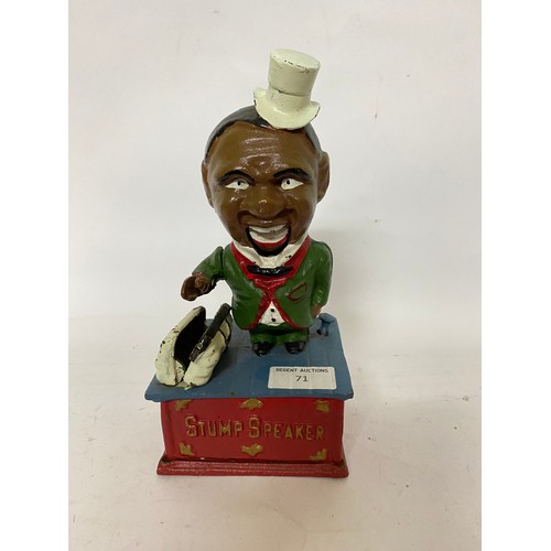 71 - Black boy stump speaker cast iron money box.