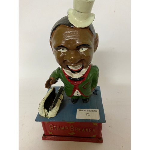 71 - Black boy stump speaker cast iron money box.