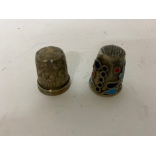 74 - 4 sterling silver thimbles.